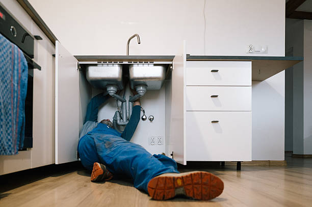 Professional Emergency Plumber technician working in Springs, NY